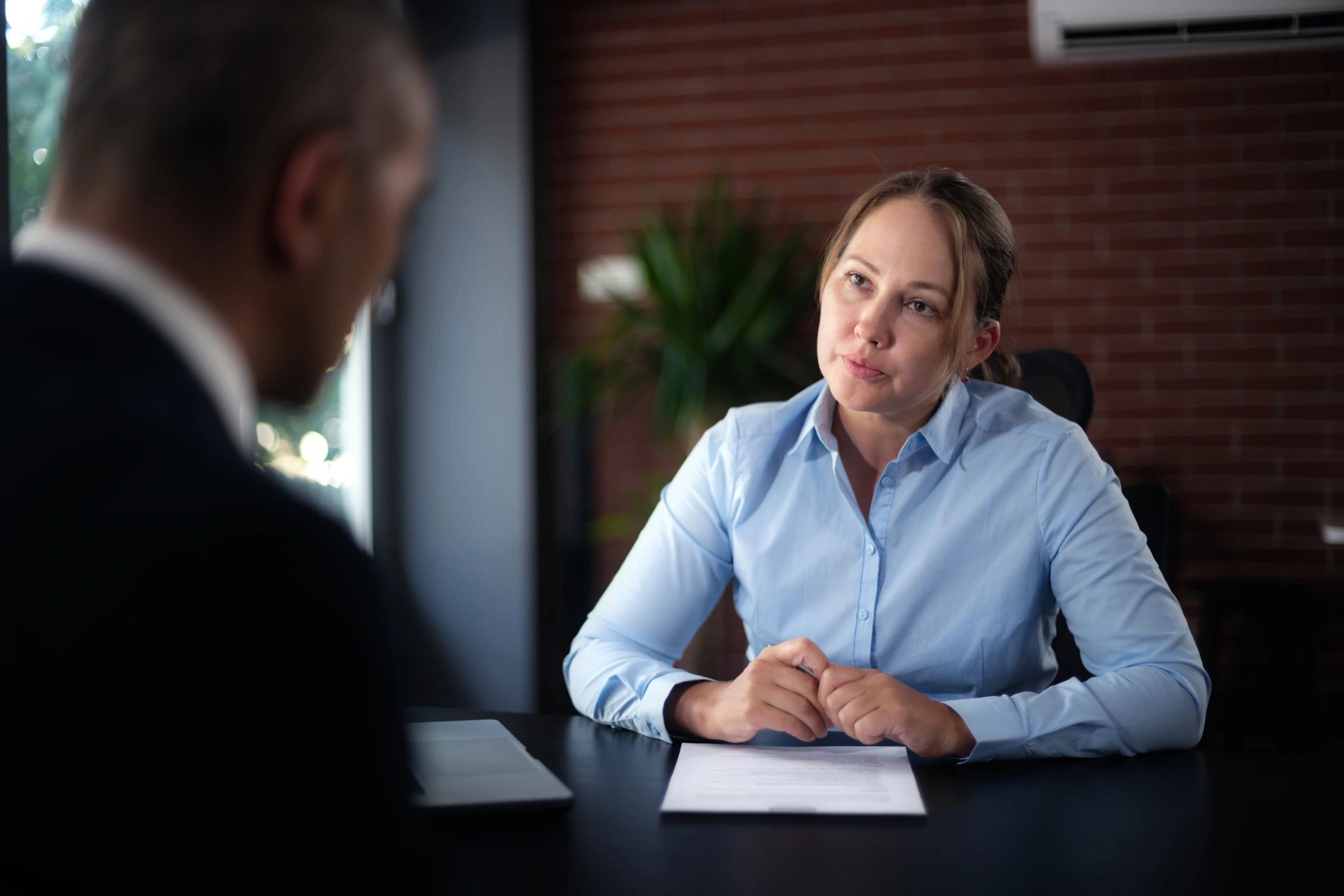 Professional meeting discussing referral information
