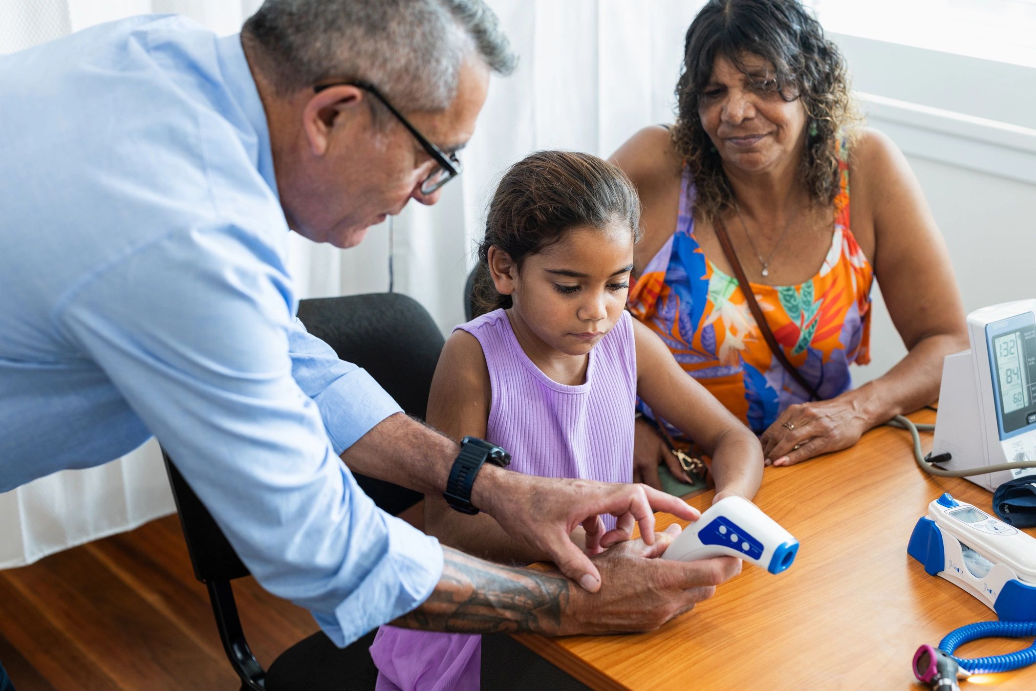 Supportive check-in with a child and caregiver during an assessment